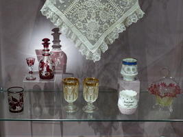 Gold trim, red trim glasses and bottles