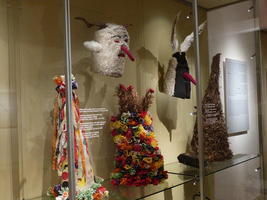 Traditional over-head masks with long noses and horns