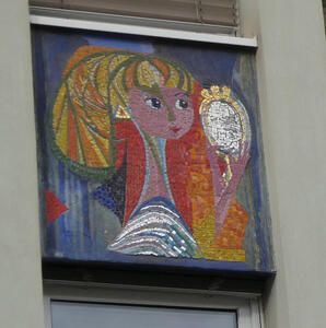 Woman holding a mirror