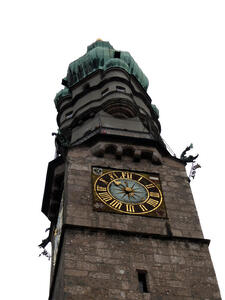 Tower of building with clock face.