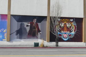 Musketeer-style swordsman ; tiger head