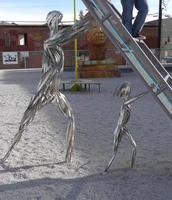 Metal man and child