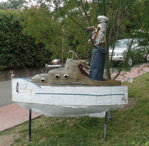 Saillor standing in boat