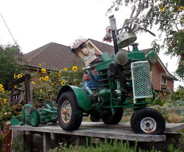 Driver on green tractor