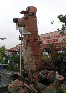 Gopher holding tools (sculpture in front of hardware center)