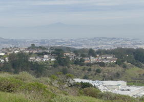 Long view of city from hill