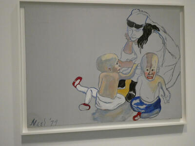 Woman with two babies playing on floor