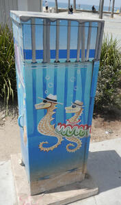 seahorses in hats with sunglasses