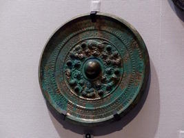 bronze round symbol of authority