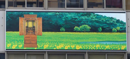 signage meadow with flowers and buddhist shrine