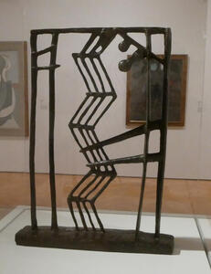 Metal sculpture that looks somewhat like sheets of paper connected together