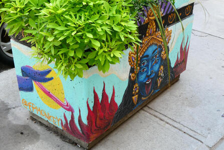 four eyed hindu deity planter