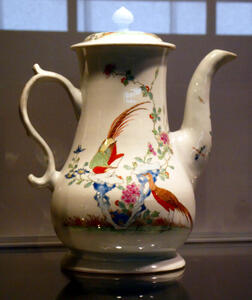 coffee pot with bird decorations