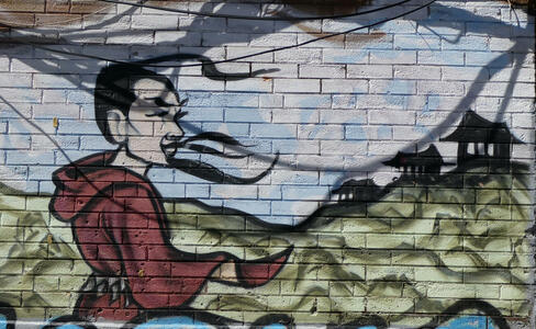 bearded chinese man in red robe