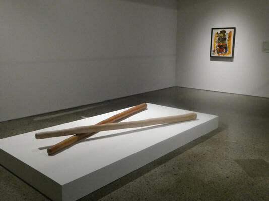 two large sticks crossed over one another