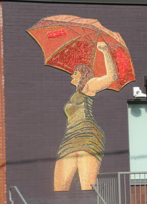 wall painting woman with red umbrella