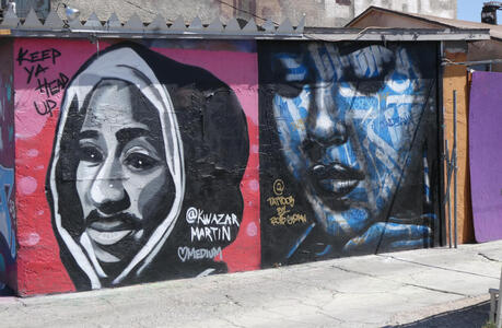 Painting of man with mustache in hoodie and woman with eyes closed