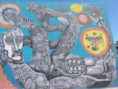 Face with sun and stars on it