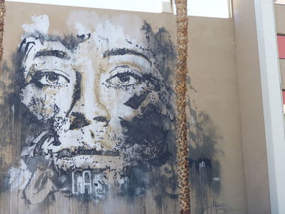 Multi-story face on side of parking structure