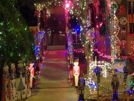 Over-decorated house with christmas ornaments at night