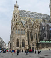 Large church with geometric pattern of diamonds and angled lines on roof