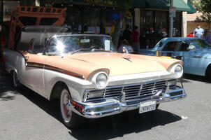 Convertible with peach hood and white side