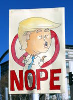 Cartoon image of Trump with international “no” symbol; text: NOPE